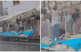 Guspini, i commercianti sfidano il nubifragio per salvare le bancarelle | Video